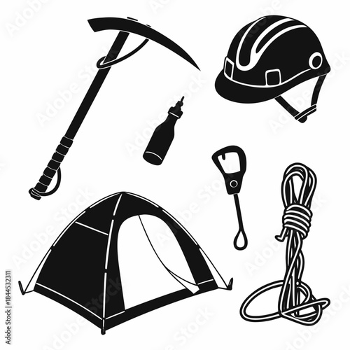 Black silhouette set of mountain climbing gear ice axe
