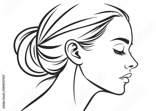 A beautiful woman with her hair in a bun looking to the right side