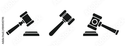 Collection of three black silhouette gavel icons representing law and justice