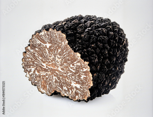 Black Truffle Isolated on White Background, Luxury Edible Fungi Representing Gourmet Cuisine and Aromatic Flavor Concept