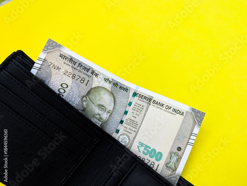 Billede på lærred Five hundred Indian rupee note showing Mahatma Gandhi portrait in black wallet o