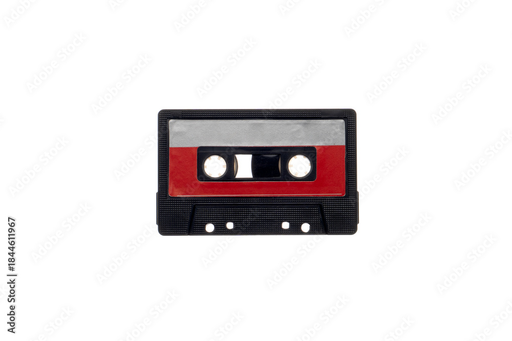 Fototapeta premium Vintage audio cassette tape in black, red, and silver on white back