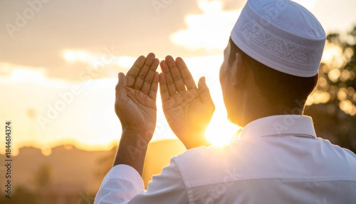 Muslim Man Praying with Beautiful Morning Sunlight