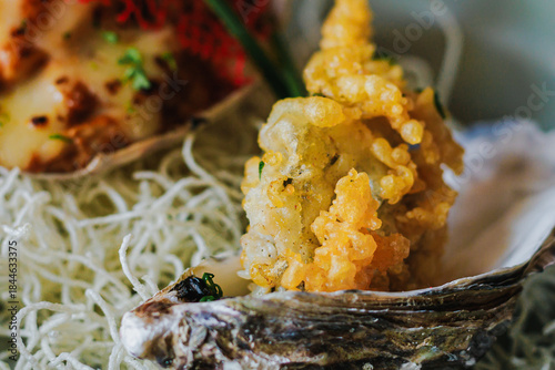 Close-up of Fried Seafood Delight with Crispy Texture on Garnished Plate with Delicate Presentation