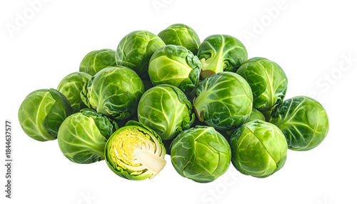 A pile of fresh, vibrant green miniature cabbages on a black background
