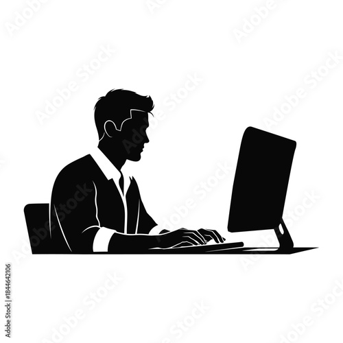 Businessman working on computer in office setting