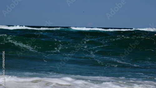 Slow Motion Ocean Waves Rolling Toward the Shore