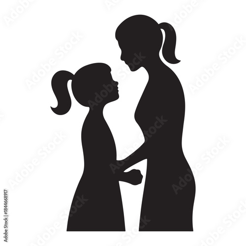 Silhouette of a mother and daughter sharing a loving moment and looking at each other with affection.