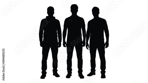 Four men standing closely together presented as a striking black and white silhouette