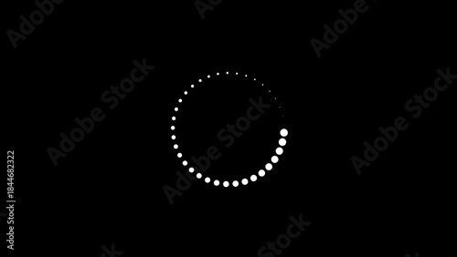 Foto Circular loading animation with white dots on a black background