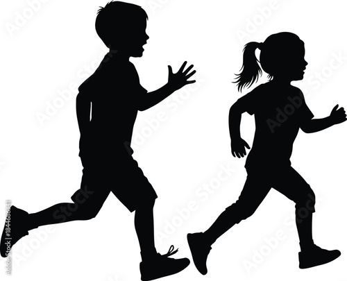 Silhouette of two children running together in a dynamic motion