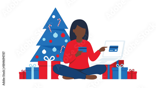 Woman shopping online for Christmas gifts with credit card and laptop