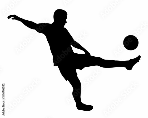 Silhouette of a soccer player kicking the ball in dynamic motion