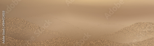 Golden desert dunes with flowing lines and dramatic ridge contrast.