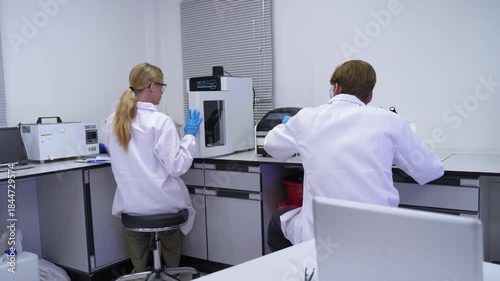 Laboratory work with two scientists conducting experiments in a research facility