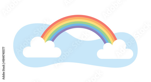 A bright and colorful seven-color rainbow arches gracefully between two fluffy white clouds against a soft blue sky shape.