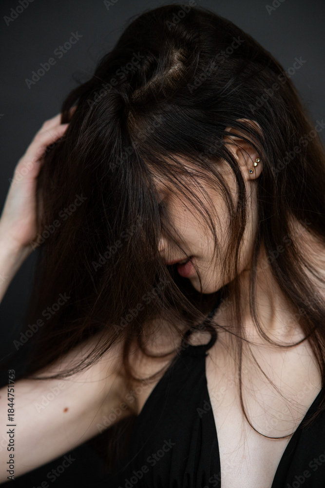 Obraz premium Young beautiful fashion model woman posing in studio, natural beauty, clean skin, professional modeling portfolio, elegant female portrait, modern style, confident look, people concept photography