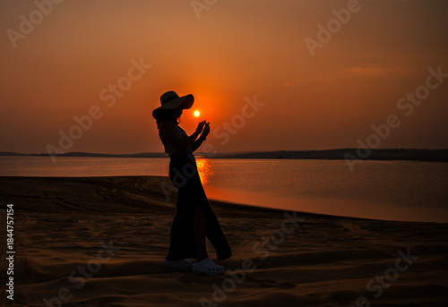 Fototapeta Naklejka Na Ścianę i Meble -  The Mesaieed Desert meets the sea in Doha, Qatar.