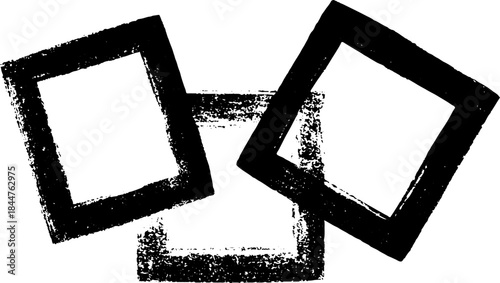 Monochrome geometric stencil art with overlapping square silhouettes for creative urban design