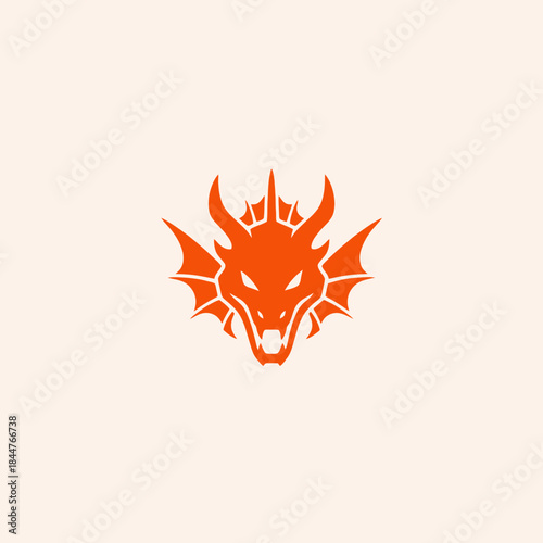 Orange Dragon Head Logo Design with Horns and Wings.