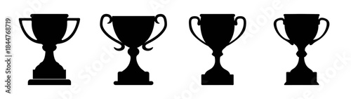 A collection of four black trophy silhouettes representing victory and success in competitions and sports