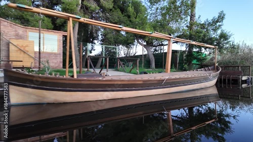Albufera lake house reflection in valencia at moonrise