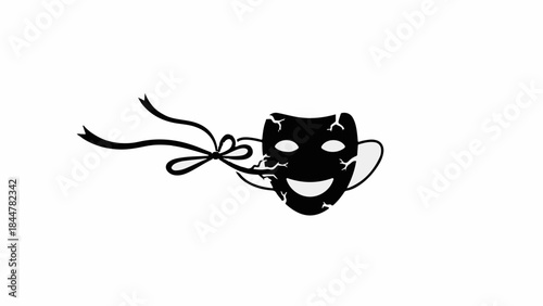 Cracked black theatrical mask with a happy expression tied with ribbon on white background