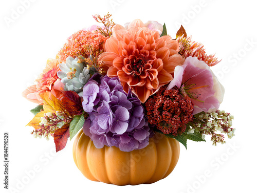 Autumn floral arrangement in orange pumpkin vase