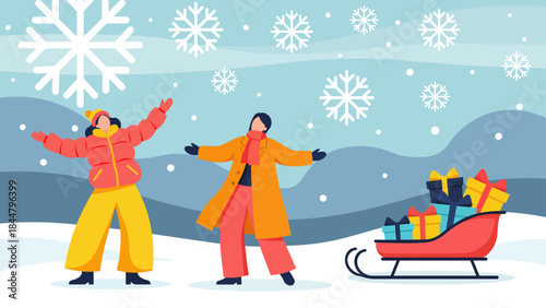 Winter joy: Two friends with arms outstretched in falling snow, standing near a festive sleigh full of gifts.