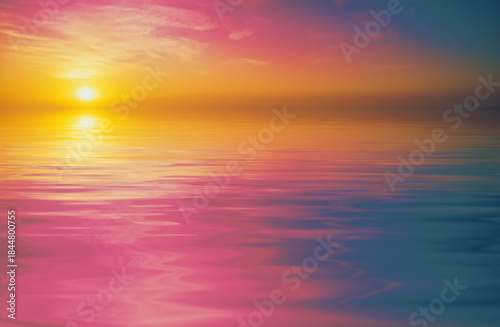 Peaceful sunset and vivid sky reflected in calm water