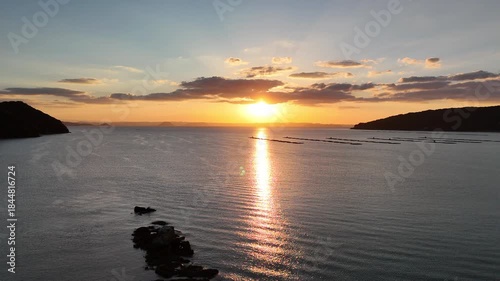 Hikizu Bay, Itoshima, Fukuoka, Japan Coastline in Autumn: 4K Aerial Drone Footage of Rural Beach at sunset, Islands, Calm Ocean, Mountain Silhouettes and Scenic Coastal Landscape