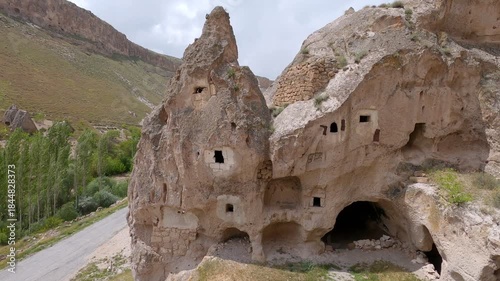 Cappadocia cave houses seen from rock dwelling window in Soganli valley, Turkey