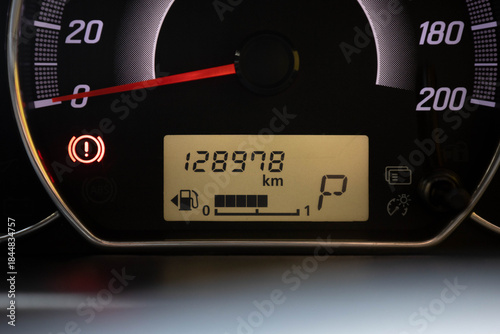 Φωτογραφία Car instrument cluster showing speedometer, odometer, fuel gauge, warning light,