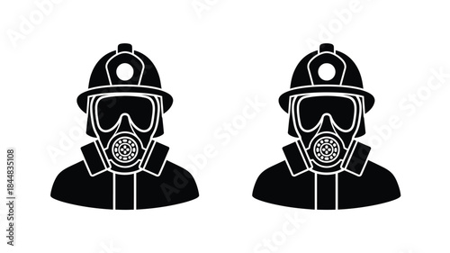 Two firefighters in full gear a striking black and white silhouette