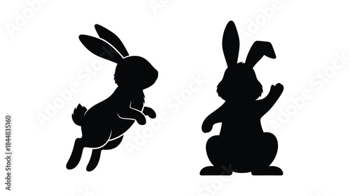 Two black rabbit silhouettes in different poses a charming wildlife depiction silhouette
