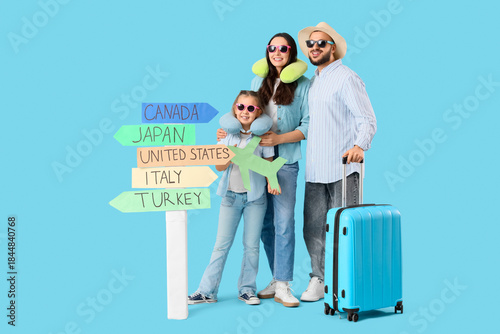 Family of travelers with pa...