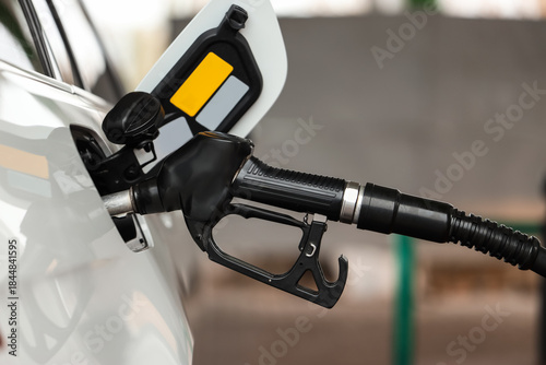 Refueling nozzle in car's f...