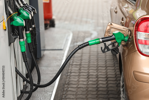 Refueling nozzle in car's f...