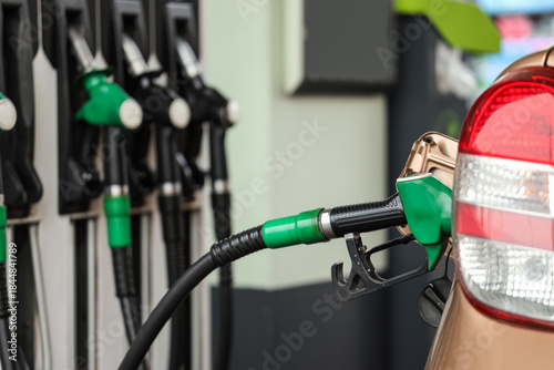 Refueling nozzle in car's f...