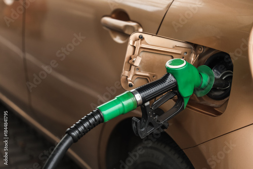 Refueling nozzle in car's f...