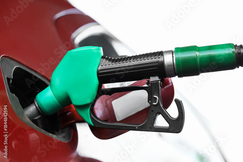 Refueling nozzle in car's f...