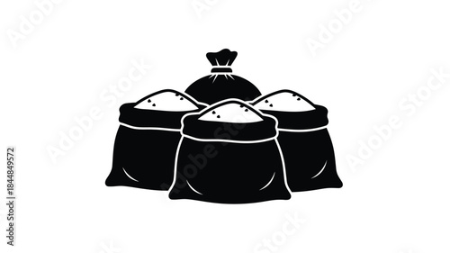 A collection of stacked grain sacks presented in dark silhouette