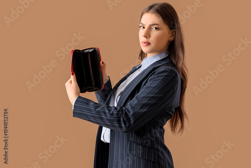 Young businesswoman with em...