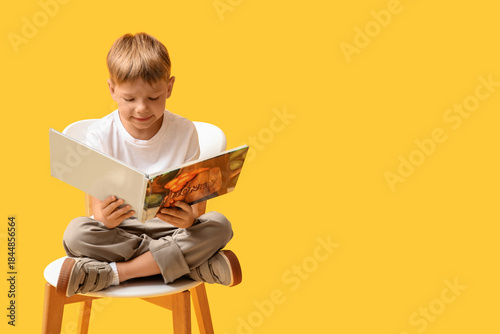 Cute little boy sitting on ...