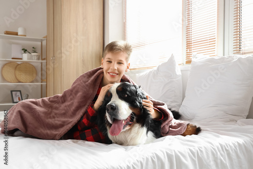 Little boy with blanket hug...