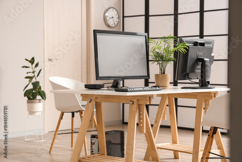 Modern desk with computer m...