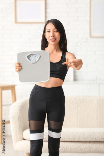 Beautiful young Asian woman...