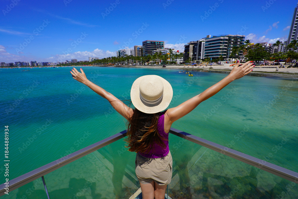 Fototapeta premium Holidays in Brazilian Caribbean. Beautiful tourist woman on belvedere in the city of Maceio, Alagoas, Brazil.