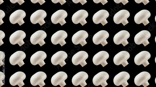 Seamless looping pattern of stylized champignon icons, creating a simple, light gray and white repetitive background.