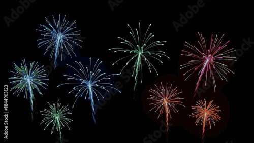 Vibrant colorful fireworks exploding against a dark night sky, creating a festive and dazzling light display.